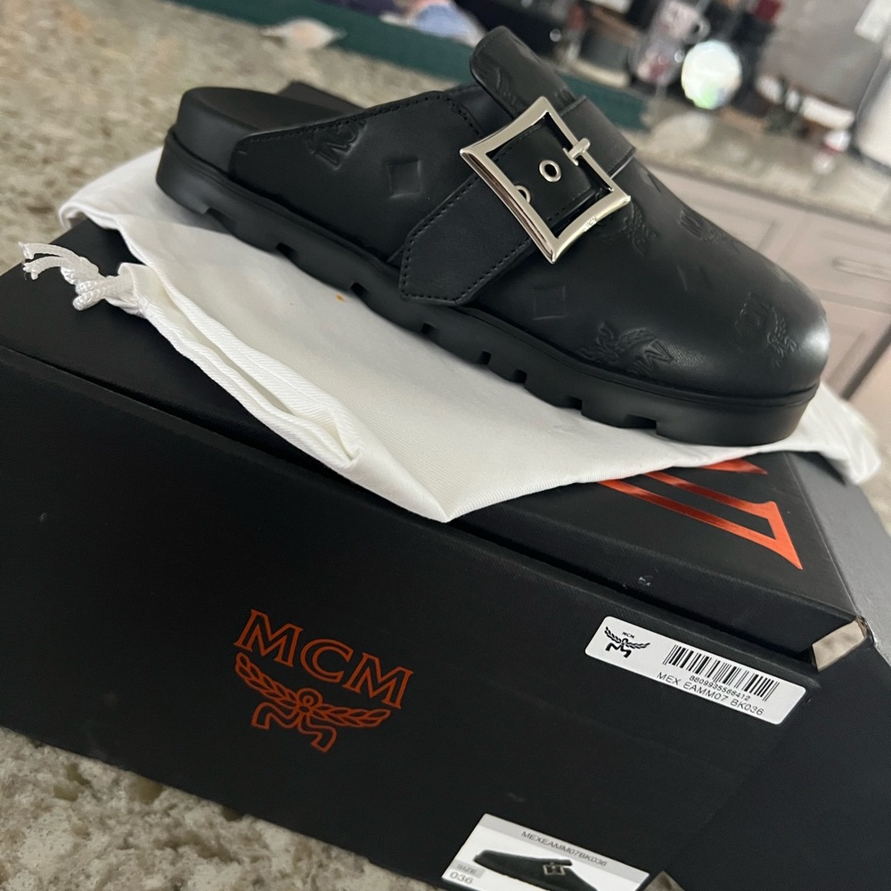 MCM Black leather unisex mules